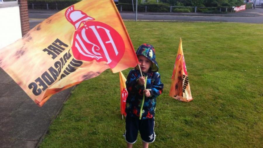 child-waving-flag