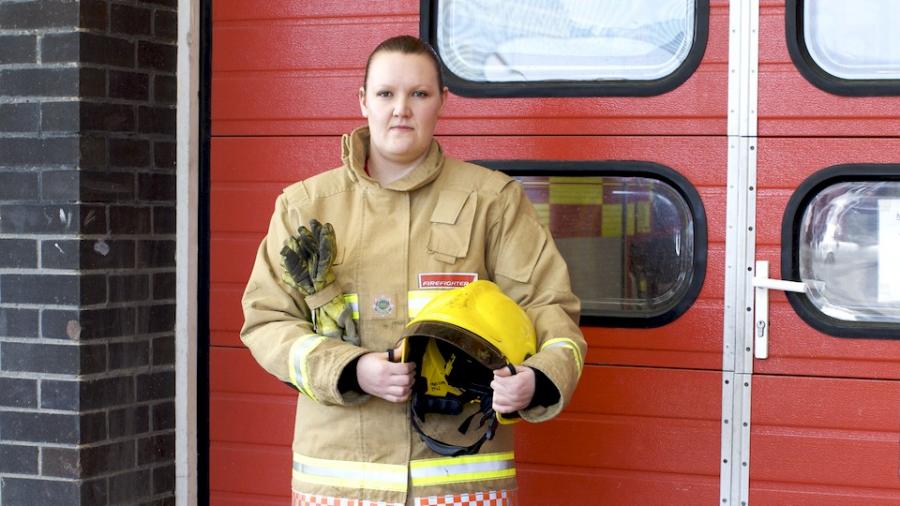 female-firefighter-by-door