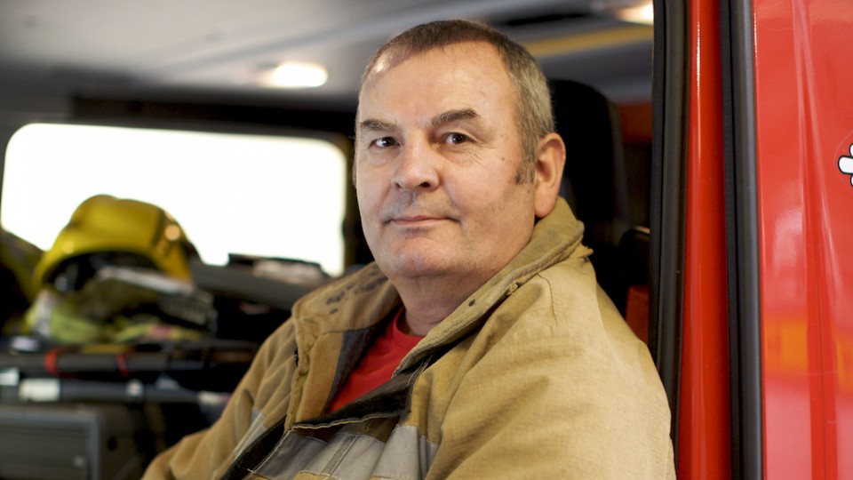 firefighter-in-engine-passenger-seat