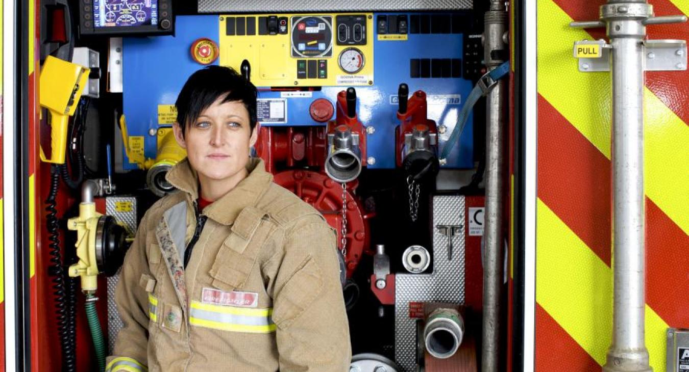 female firefighter fire applicance