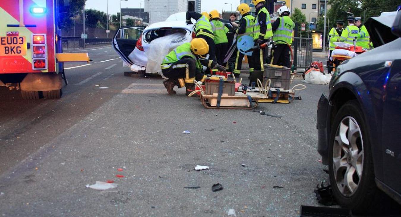 firefighters street car crash