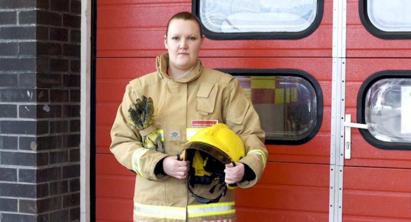 female-firefighter-by-door