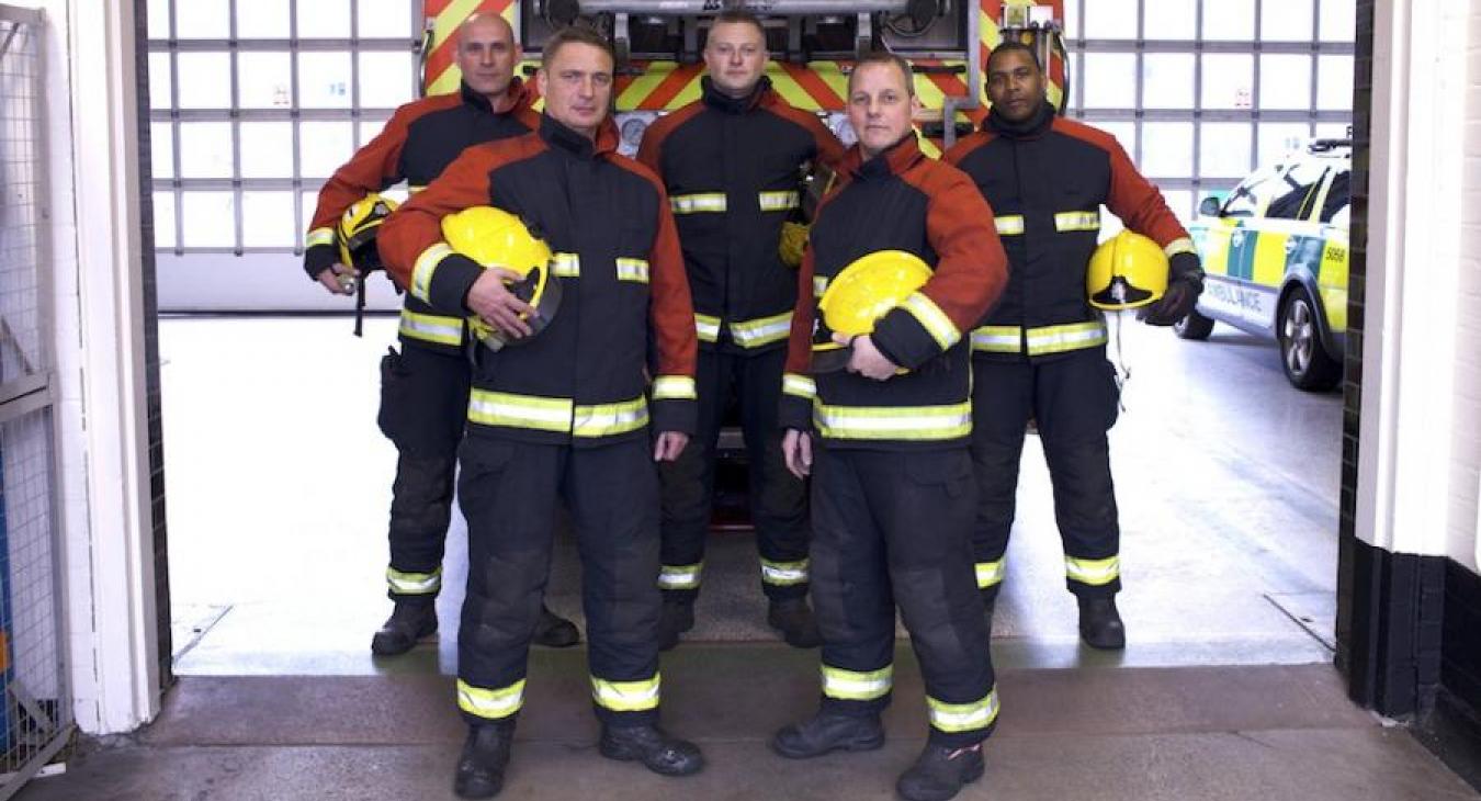 fire-firefighters-standing-front-engine