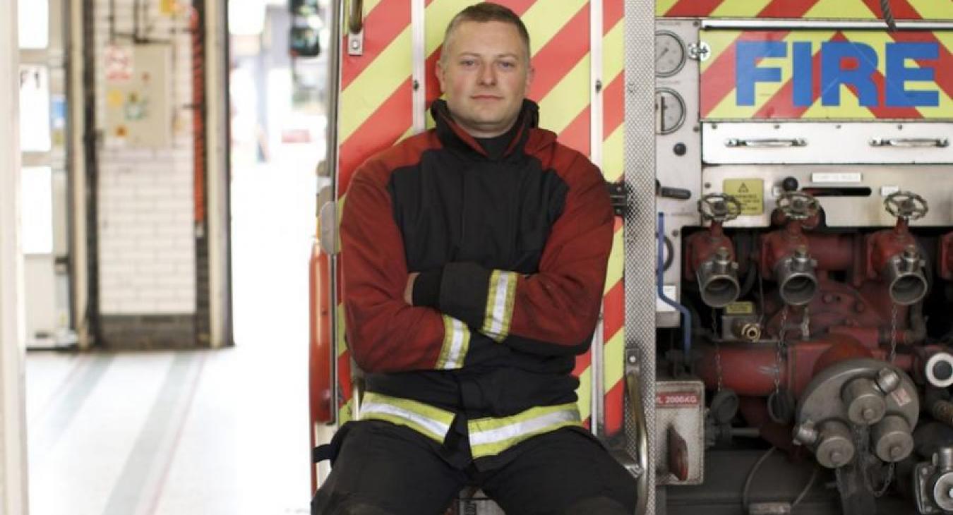 firefighetsr-sitting-on-engine