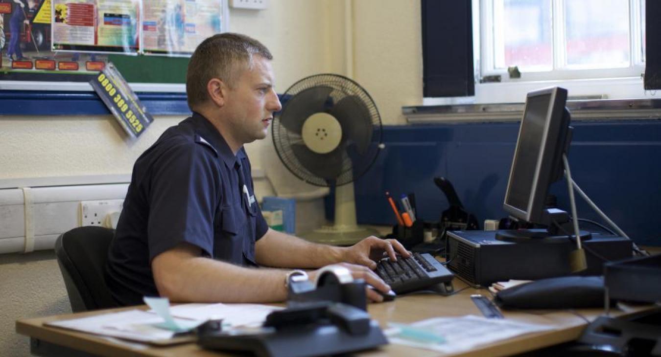 firefighter on computer