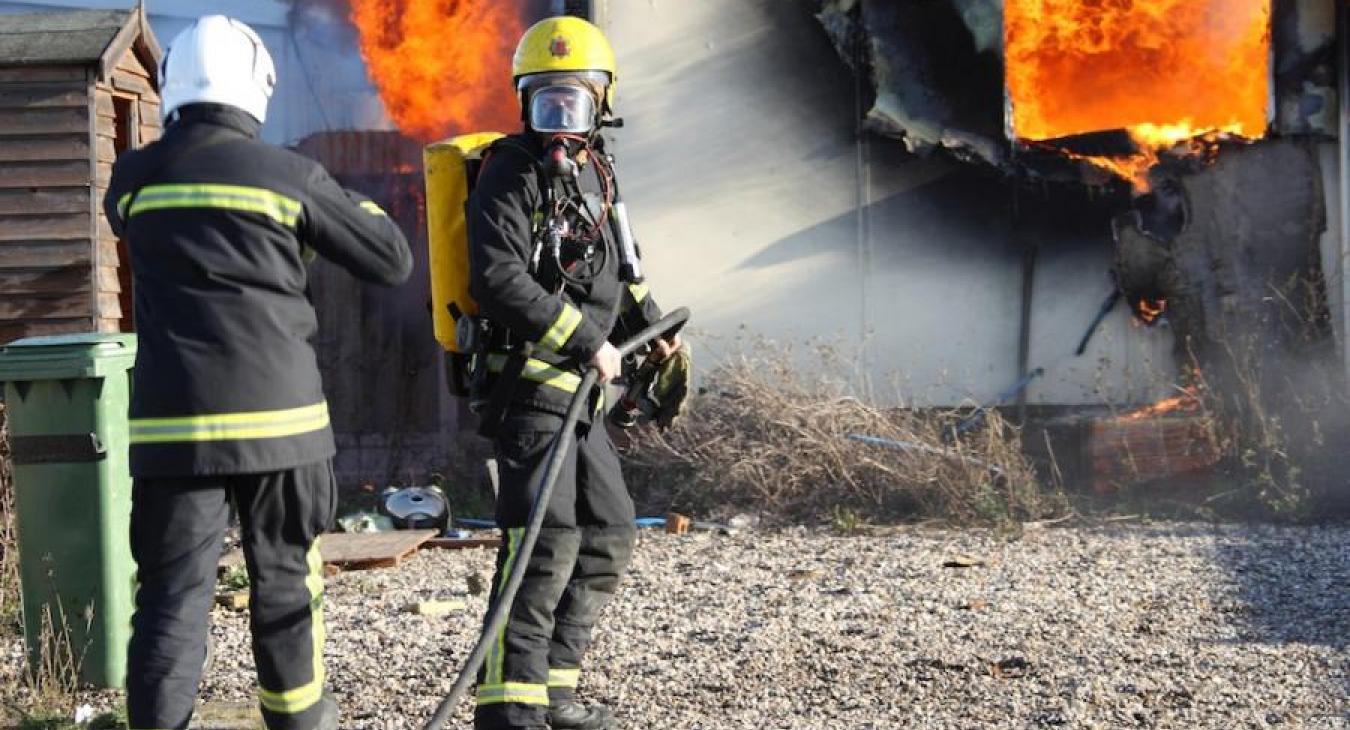firefighters-mask-building-onfire