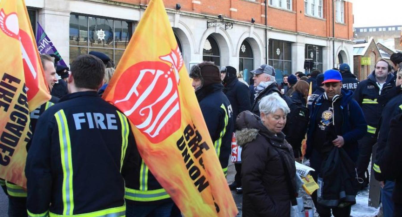 flags-protest-fire-fighters