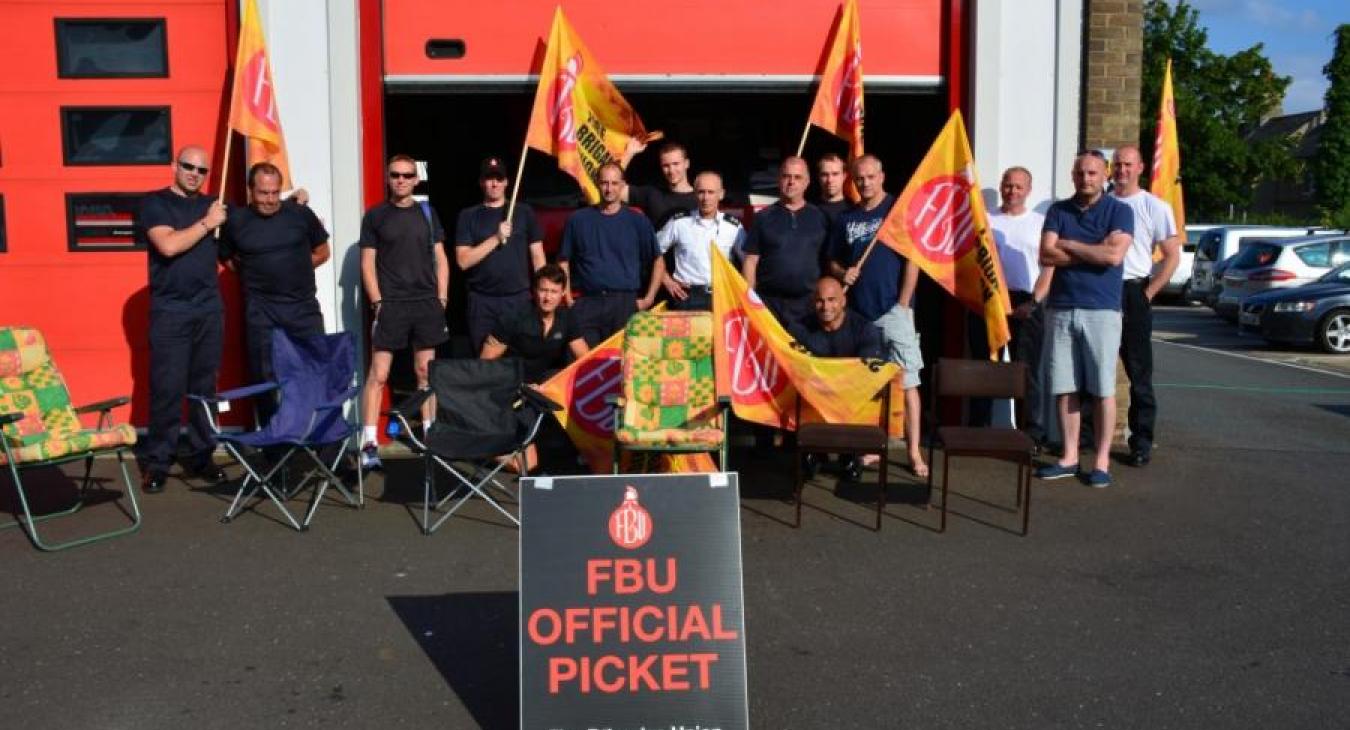protest-chairs-flags-station
