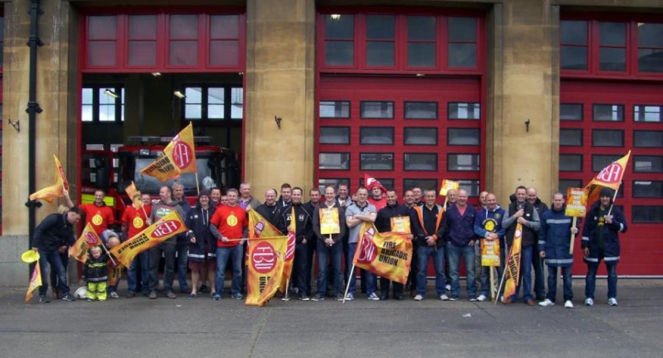 protest-flags-outside-front-station